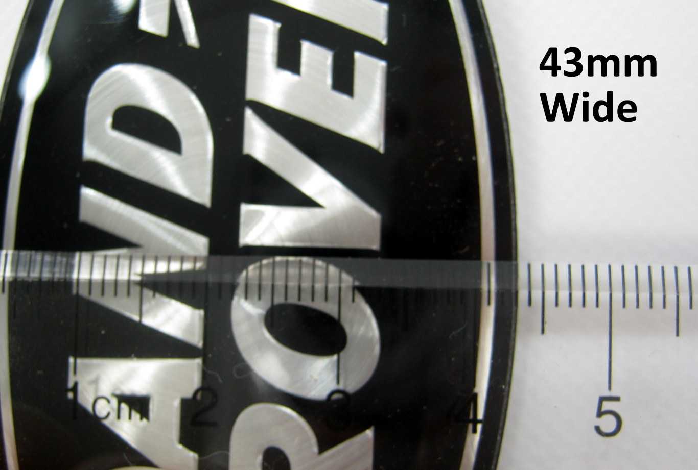 Genuine Front Grille Badge - Black & Silver - for Land Rover Discovery 3 (LR3G509 / LR3G061)