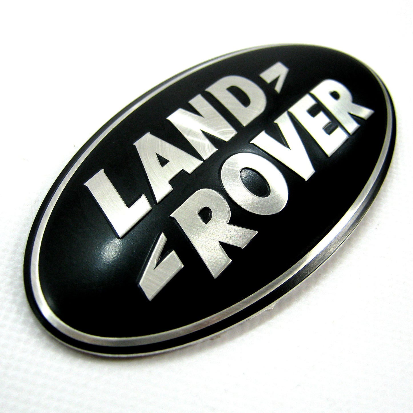 Genuine Front Grille Badge - Black & Silver - for Land Rover Discovery 3 (LR3G509 / LR3G061)