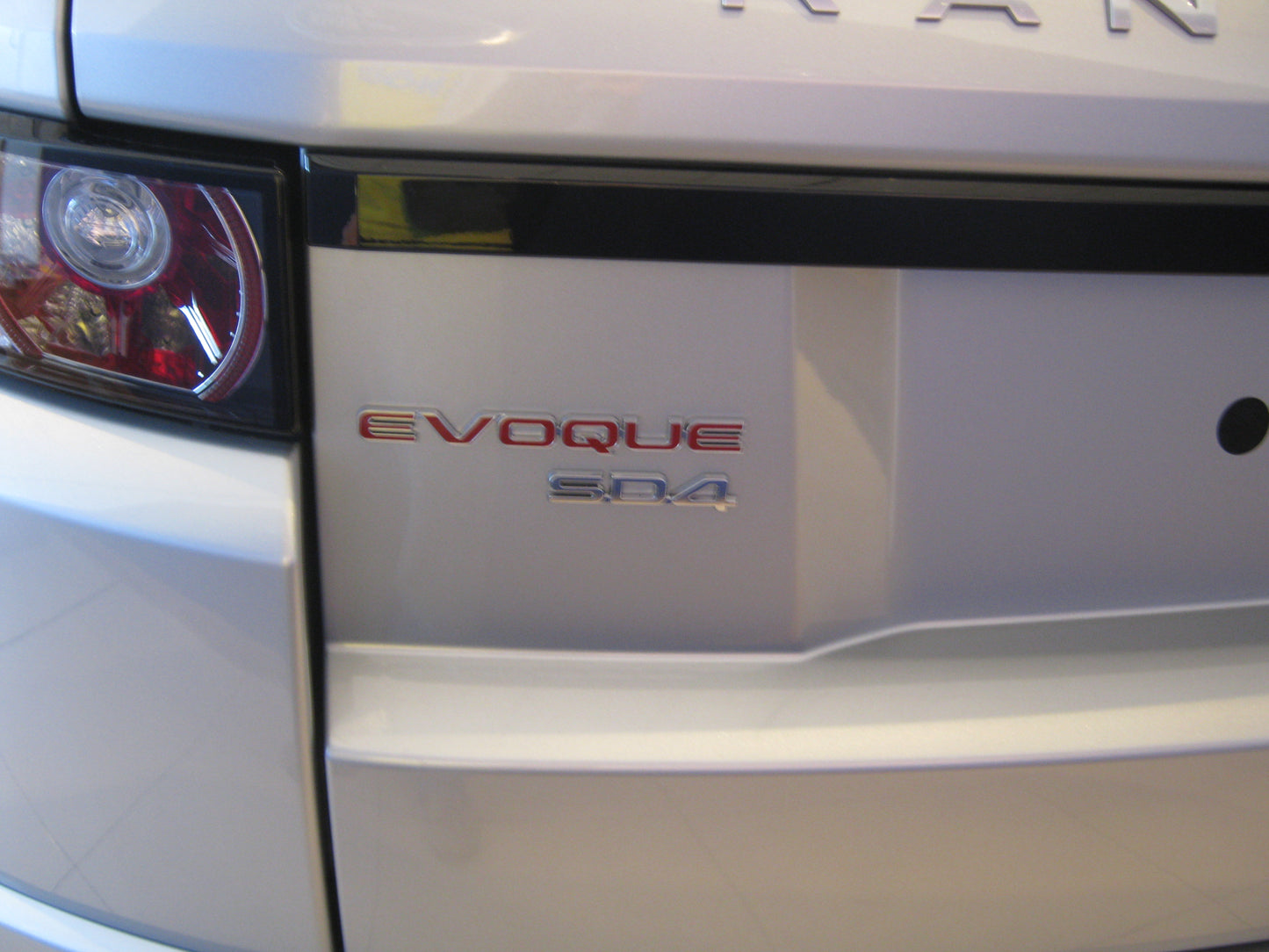 Genuine "EVOQUE SD4" Rear Badge - Red for Range Rover Evoque