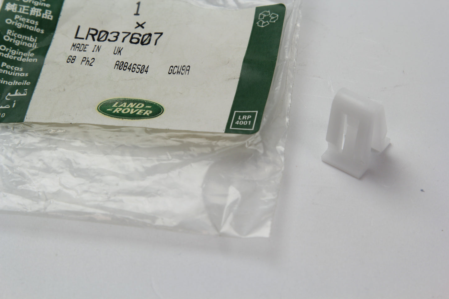 Replacement White Plastic Tailgate Trim Retaining Clips - Genuine